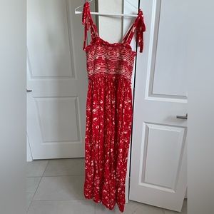 Red floral free people jumpsuit